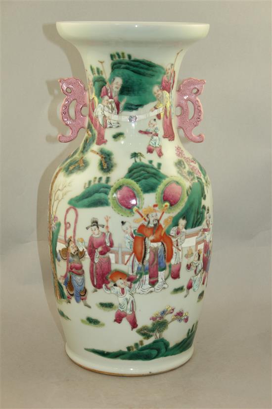 A Chinese famille rose two handled baluster vase and cover, 44cm